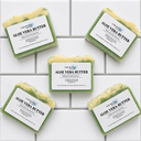Five bars of Aloe Vera Butter soap from COCOLOND Soapery on a tiled surface
