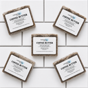Five bars of Coffee Butter soap from COCOLOND Soapery on a tiled surface